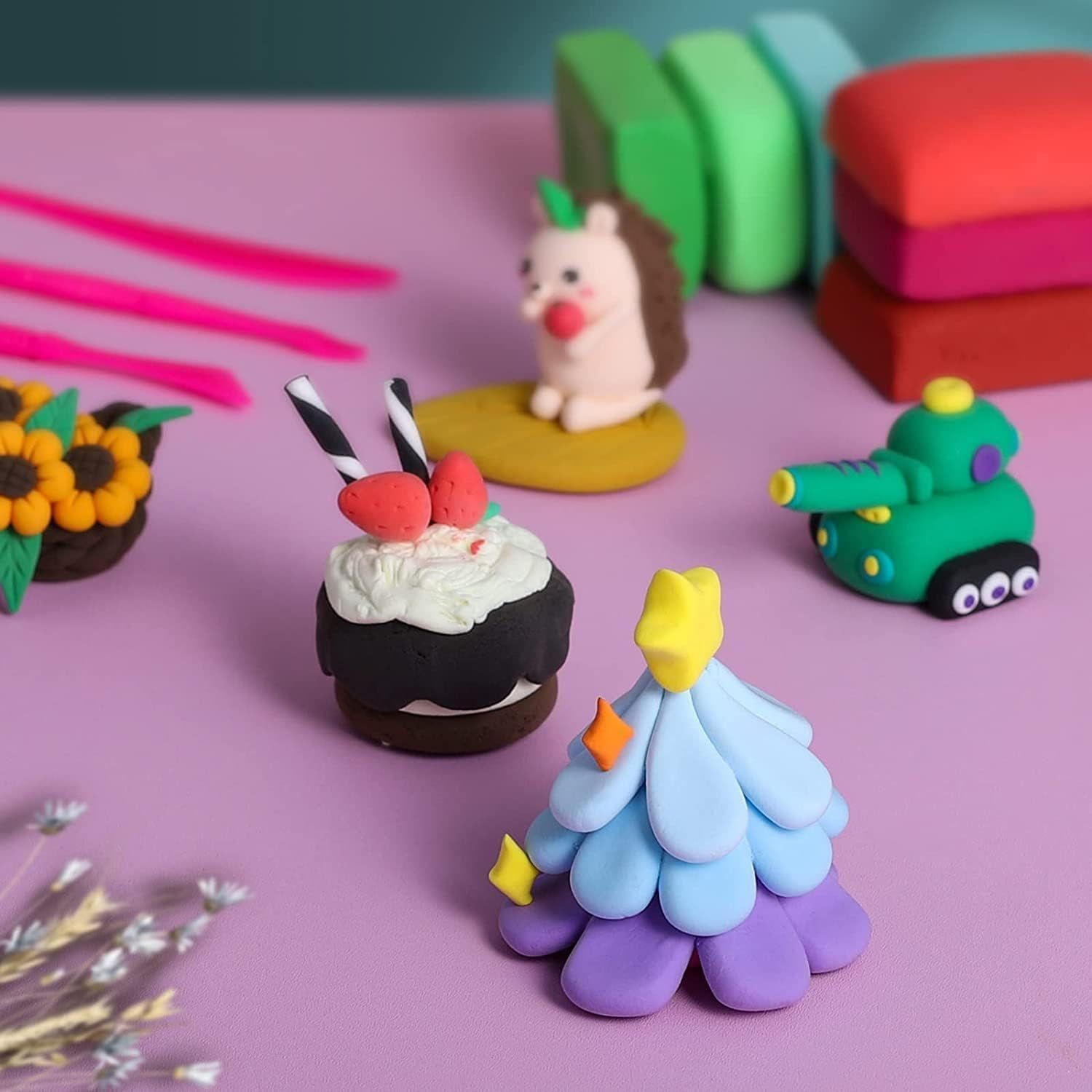 Displays finished clay creations in a real-world setting to inspire shoppers and demonstrate the creative possibilities of the product.
