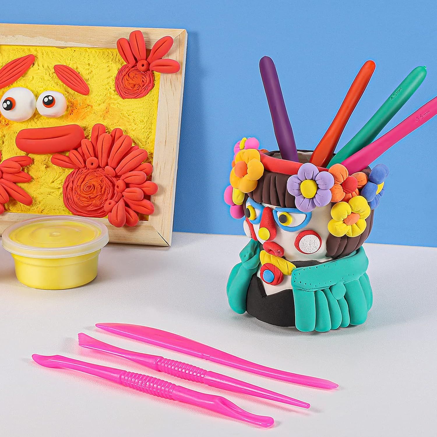 Displays finished clay projects and tools in use to demonstrate the creative potential and versatility of the air dry clay product.